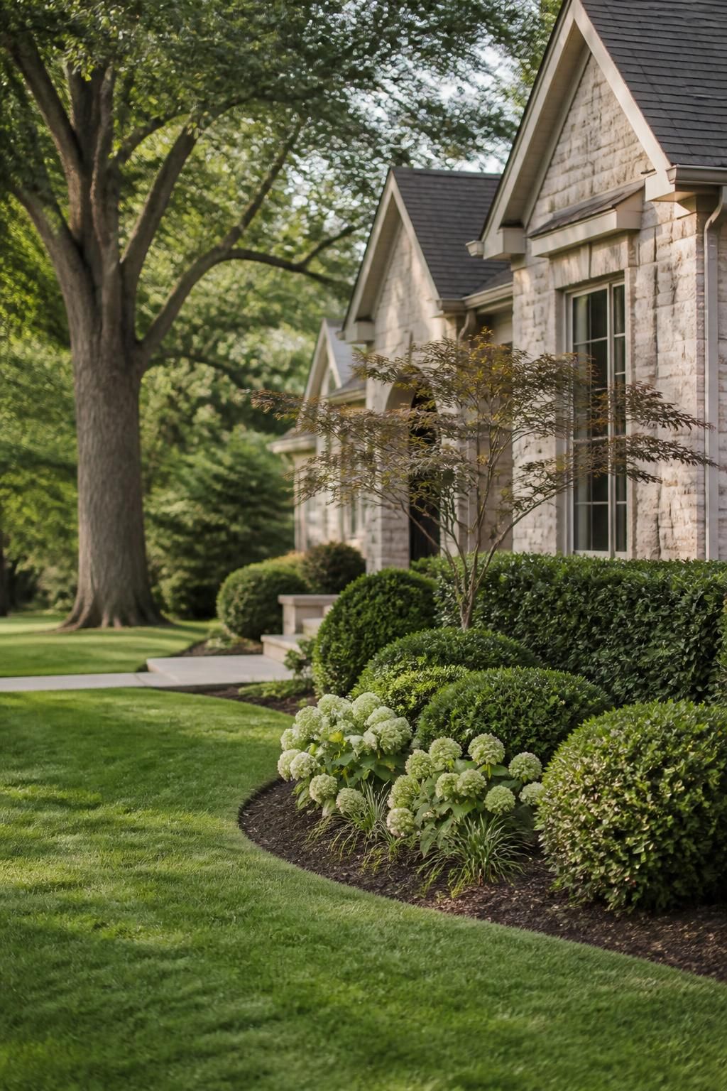 Well-maintained yard with trimmed shrubs and clean lawn edges