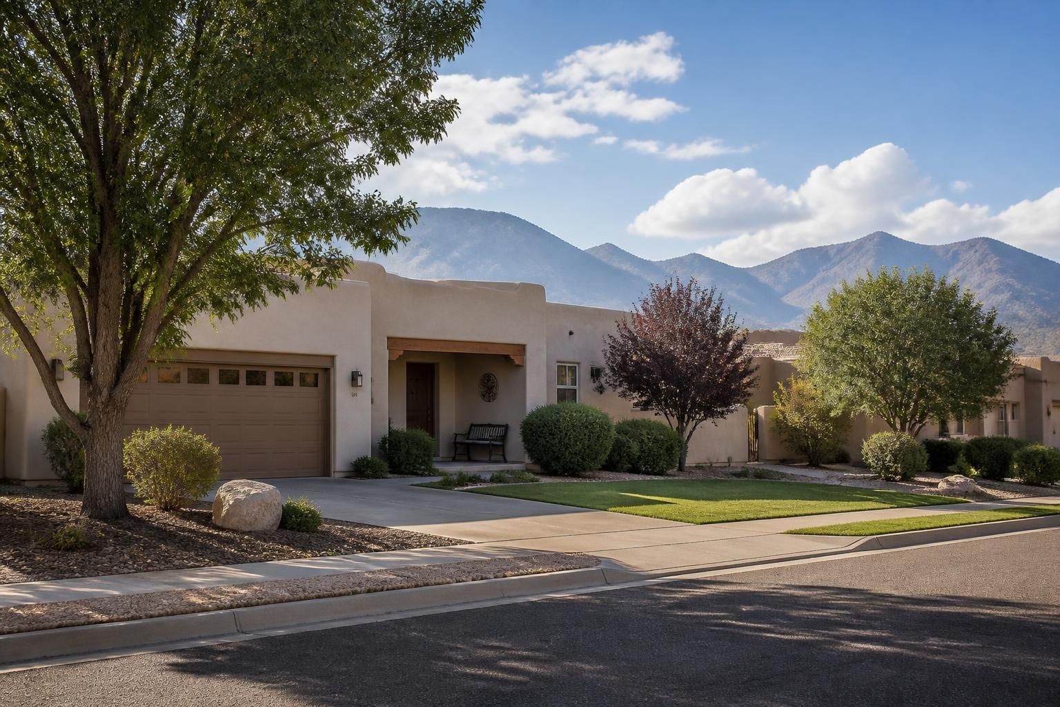 Suburban neighborhood with trimmed trees in Los Lunas